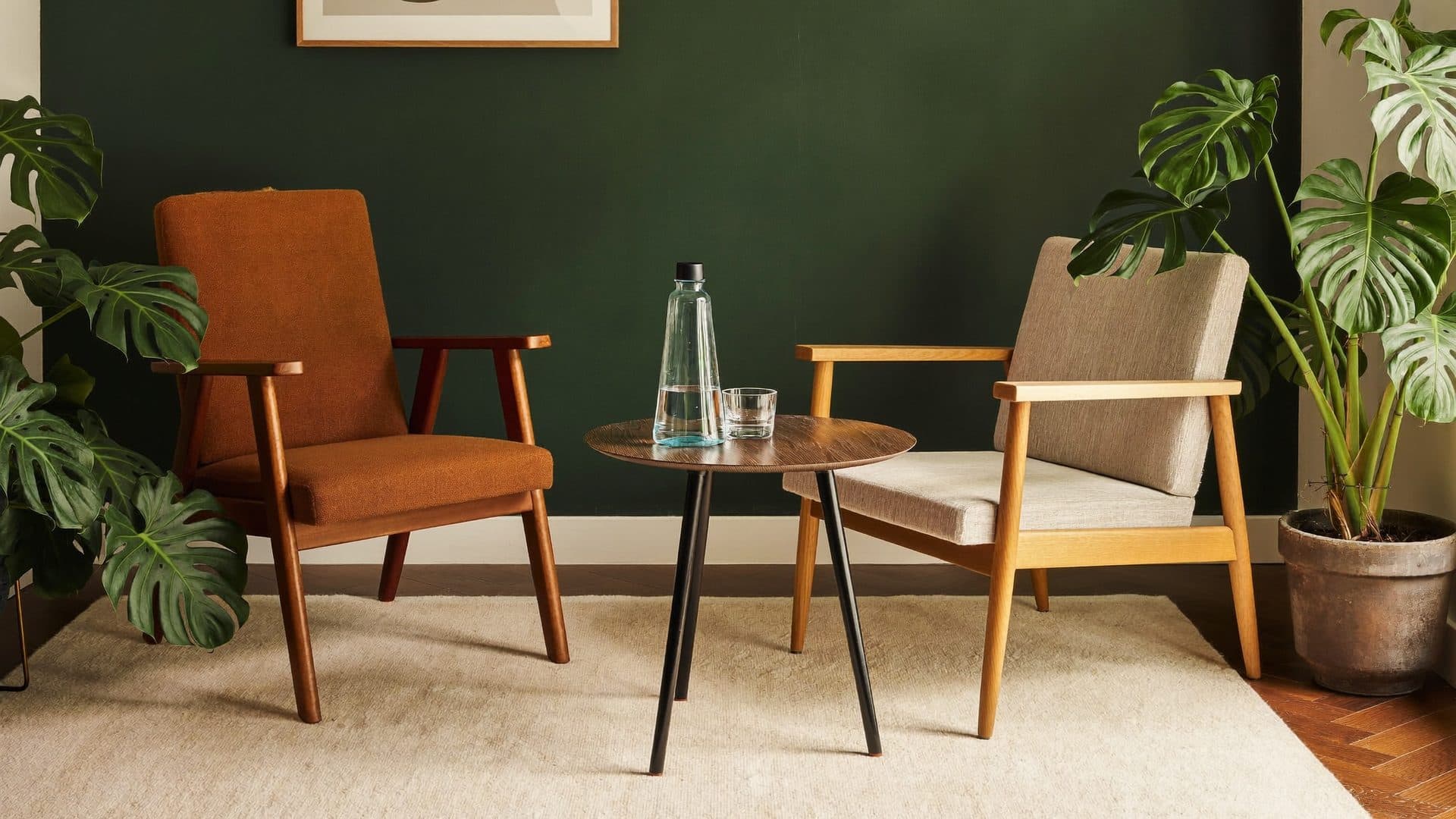 A warm conversation corner with two chairs angled toward each other